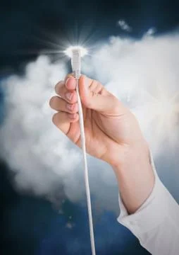Human hand connecting cable to the cloud Stock Photos