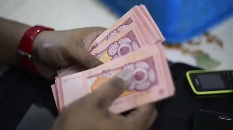Human hand counting Malaysia 10 Ringgit notes Stock-Footage 52587456