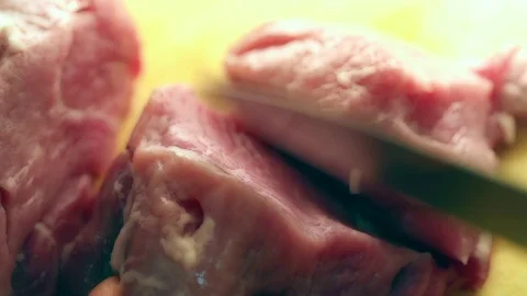 Human  hand cutting meat Stock Footage 71641096