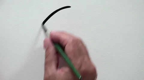 Human hand drawing wicked smiley with Black ink Video stock 54098787