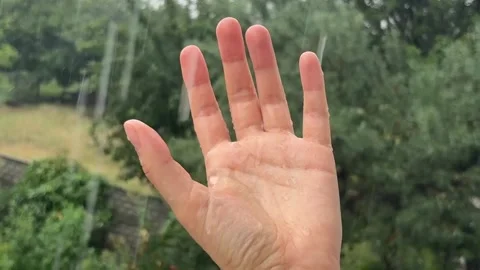 Human Hand Feeling Rain – Macro Cinematic Shot 스톡 동영상 314425948
