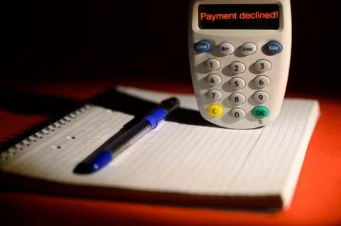 Human hand finalizing contactless card reader for transaction decline of purc Stock Photos