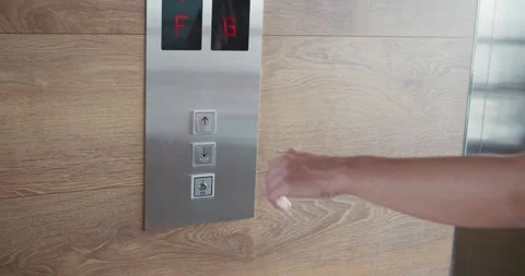 Human hand finger presses up button calling elevator in close-up slow motion Video stock 263910480