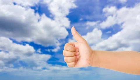 Human hand gesture something with sky background Stock Photos