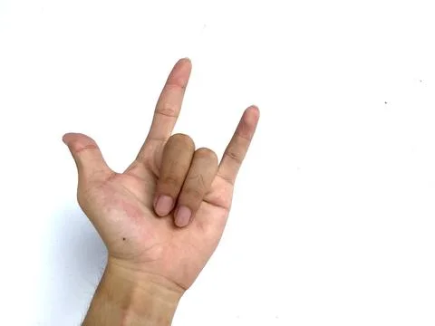 Human hand gesturing rock and roll, heavy metal Stock Photos