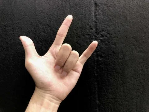 Human hand gesturing rock and roll Stock Photos
