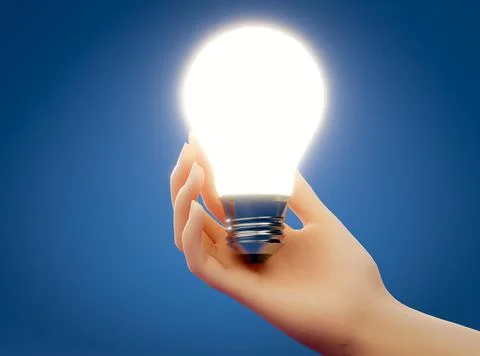 Human hand holding glowing light bulb over blue background. Concept of energy Ilustração Stock
