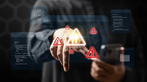 Human hand interacting with a touchscreen device, displaying warning signs .. Stock Photos