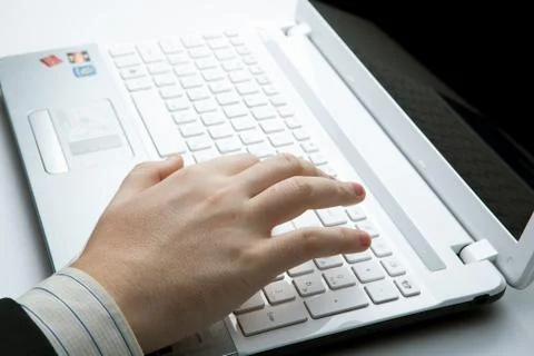 Human hand on the keyboard Stock Photos