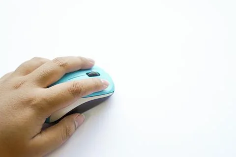 Human hand on a light blue wireless mouse Stock Photos
