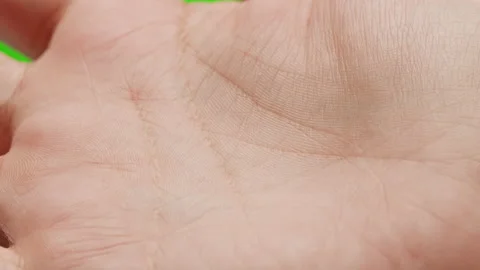 Human hand with lines, Palm reading, foretelling the future through the study of Stock Footage 223164226