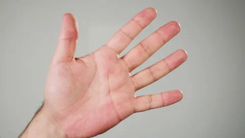 Human hand making fingerprints on grey background. Person pressing fingers on Video stock 182019892