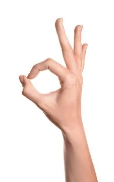 Human hand making OK gesture, approval and agreement concept, success and per Stock Photos