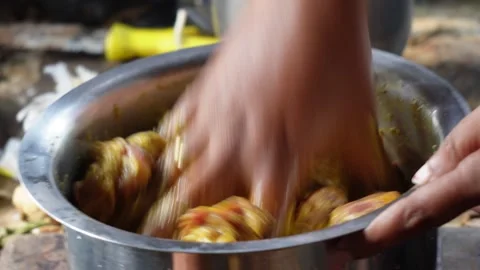 Human Hand Marinating Raw Mutton Stock Footage 332534835