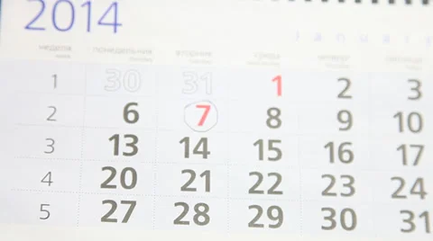 Human hand marking on a calendar Stock Footage 33408017