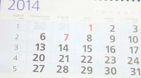 Human hand marking on a calendar Stock Footage 33408468