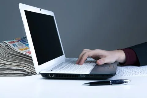 Human hand on the notebook keyboard 6 Stock Photos