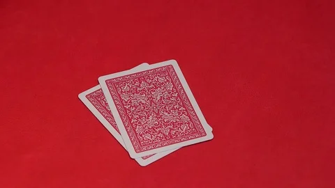 Human hand opening two cards in poker game. Stock Footage 75716647