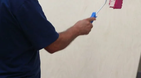 Human hand painting with roller in hand. Stock Footage 68012925