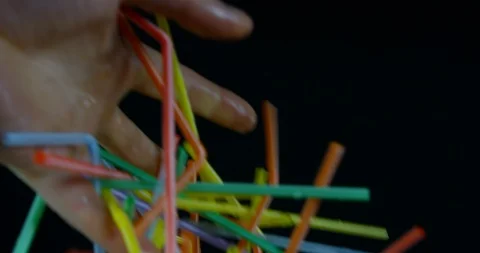 Human Hand Picking Up Plastic Colourful Straws In Anger. Plastic Pollution Stock Footage 111939413