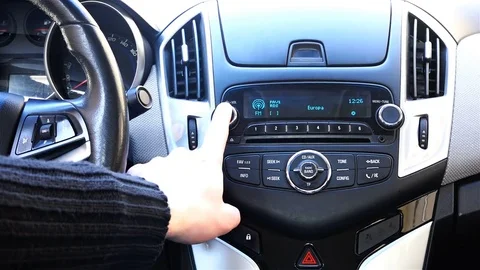 The human hand presses the buttons of the manual control of the car Stock Footage 78039176