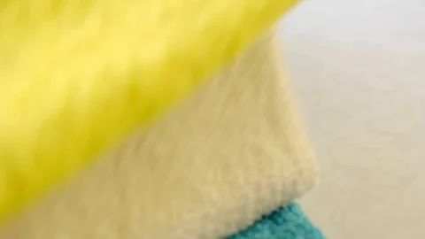 Human hand puts towels and a piece of soap Stock Footage 74227647