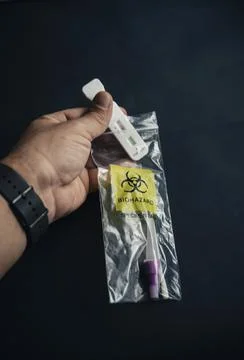 Human hand putting a negative antigen test Stock Photos