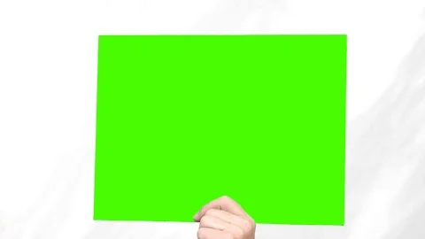 The human hand shows a green screen below. Looped video Stock Footage 92194618