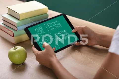 Human Hand Solving Math Problems On Digital Tablet Stock Photos