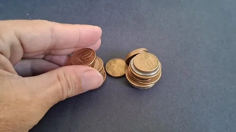 Human hand stacking metallic coins Stock-Footage 344700325