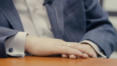 Human hand in a suit on the table 스톡 동영상 71216692