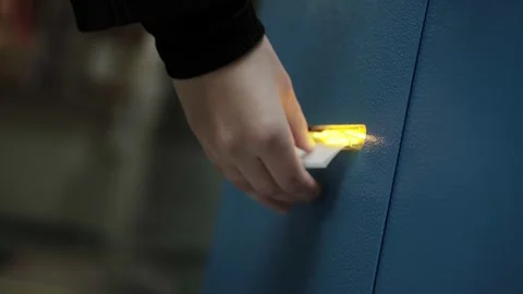 A human hand takes a ticket from the electronic queue number registrar. A device Stock Footage 317806822