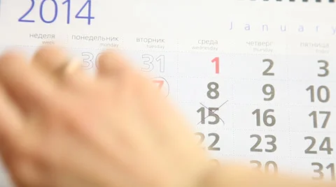 Human hand tearing off a leaf of a calendar Stock Footage 33407601