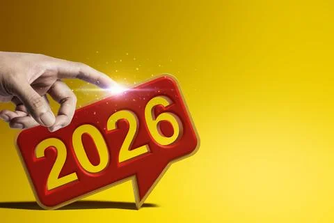 Human hand touches a speech bubble of the year 2026 on a colored background.. Stock Photos