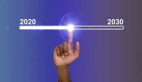 Human hand touching a glowing timeline bar between 2020 and 2030 on a futur.. Stock Photos
