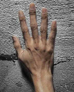 Human Hand Touching Rough Concrete Wall Texture 스톡 사진