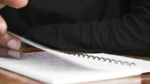 Human hand turning page Stock Footage 90810985