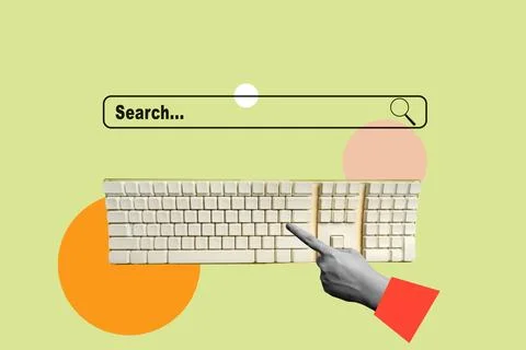 Human hand typing on a computer keyboard with a search column Stock Photos