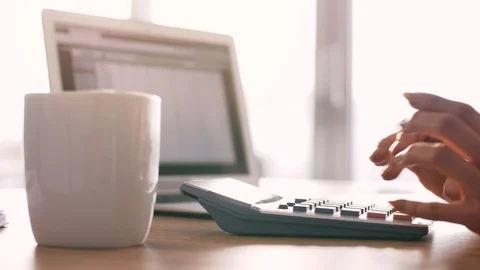 Human hand using a calculator Stock-Footage 86104867