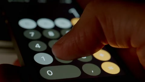 Human hand Using Calculator Software On His Smartphone Видео 147108919