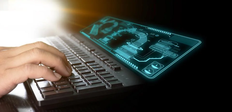Human hand using computer with futuristic industry hologram screen Foto stock