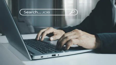 The human hand is using a computer keyboard to find information using Search Foto stock