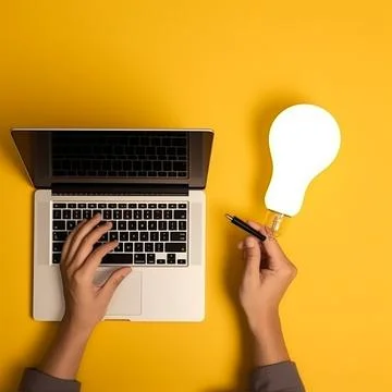 Human hand using laptop computer with light bulb flat lay Иллюстрация