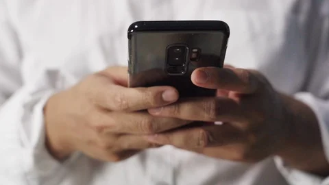 Human hand using smart phone Stock Footage 121103882