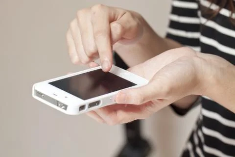 Human hand using smart phone Stock Photos