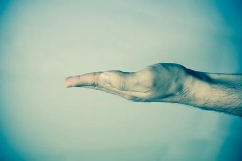 Human hand on vintage background Foto stock