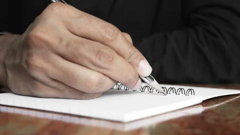 Human hand writing a note Stock Footage 90883643