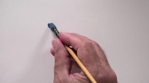 Human hand writing word "COOL" with blue gouache Video stock 54091669