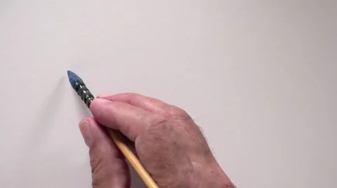 Human hand writing word "E=MC2" with blue gouache Video stock 54093308