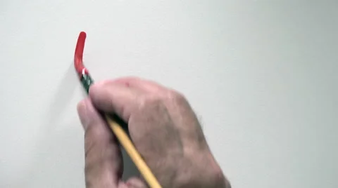 Human hand writing word "LOST" with red gouache Stock Footage 54084440